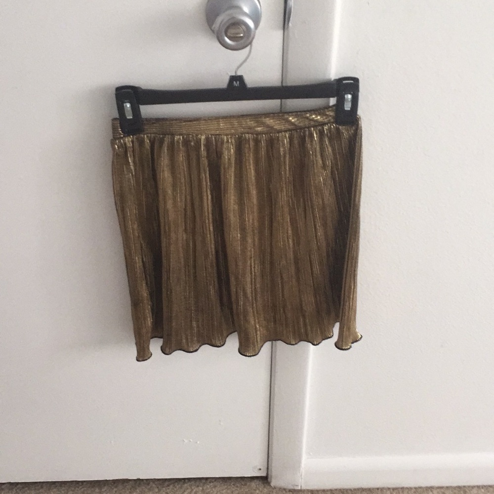 Shiny gold ruffle skirt